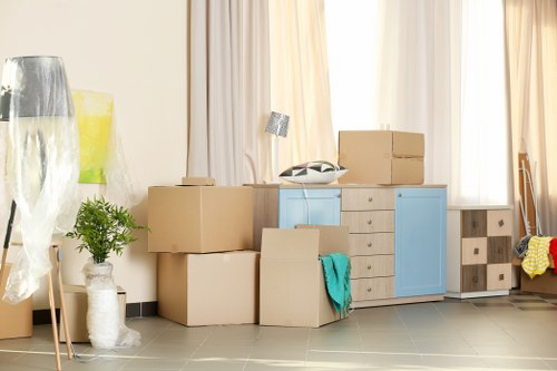 Same day removals team loading furniture in Eastham