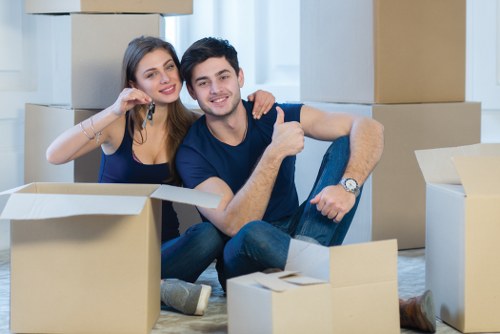 Office removals team preparing furniture for a business move in Eastham
