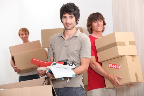 Man And Van Eastham team loading items safely into a van