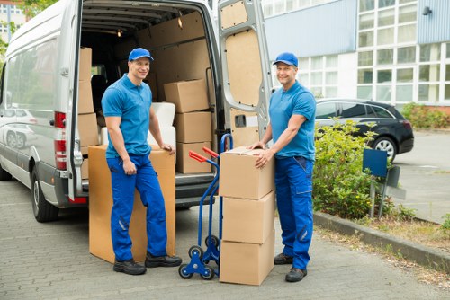 Careful loading of student belongings for transport in Eastham