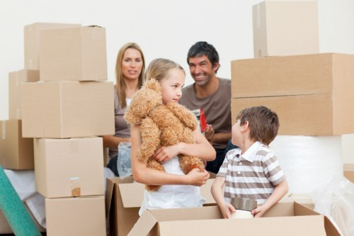 Local moving team handling furniture and packed boxes for an Eastham property